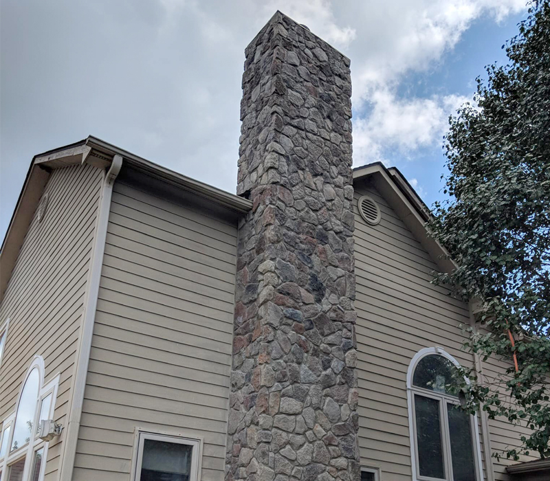 02 BRICK CHIMNEY REPAIRS